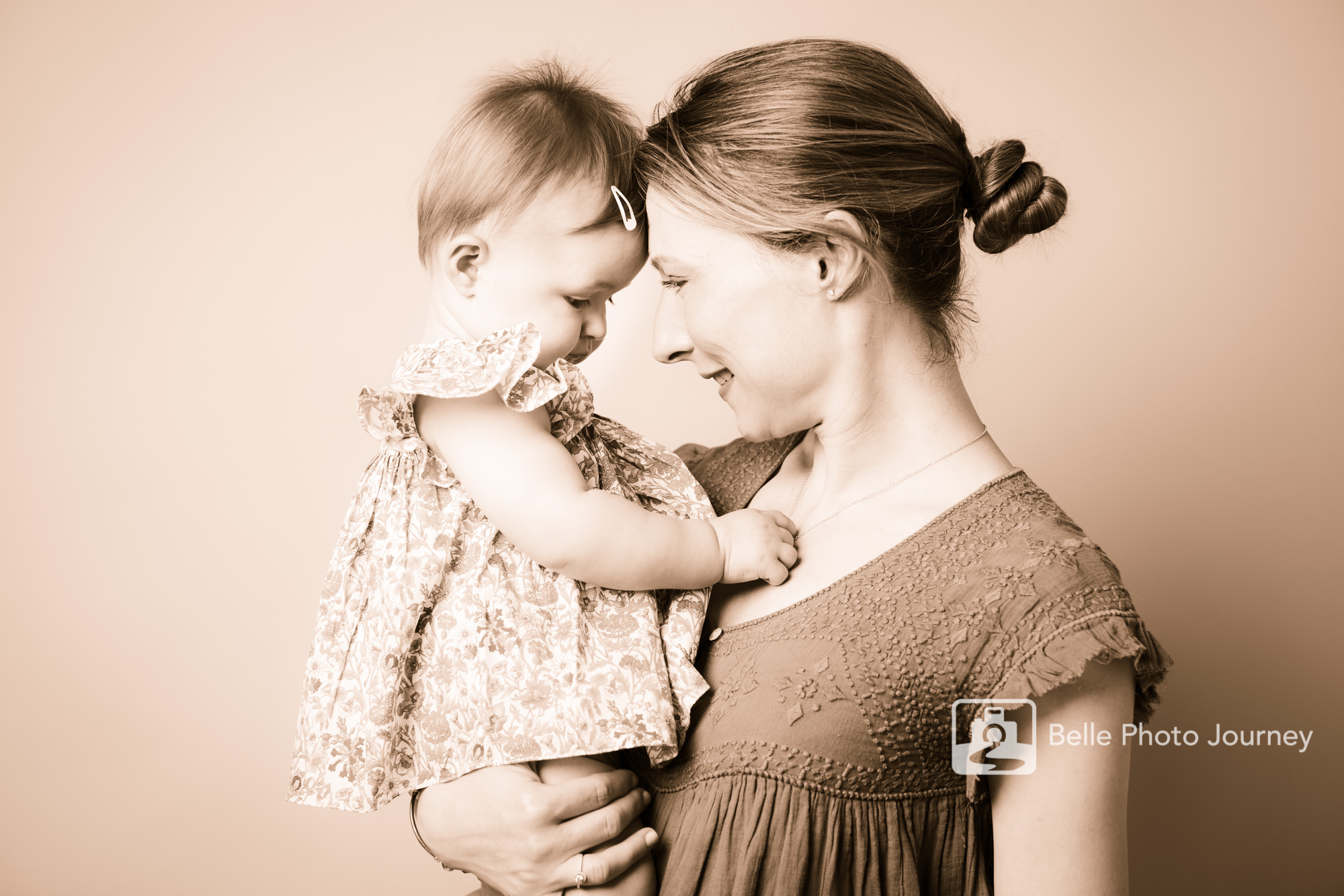 Mother and baby daughter portrait